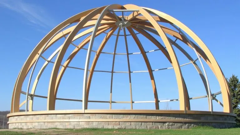 Different types of dome home framing, including geodesic and monolithic domes, showcasing their unique structures and architectural styles.