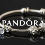 How to measure your wrist for a Pandora bracelet and choose the right size. Shows measuring tape and string methods.
