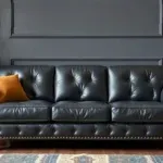 Comparison chart of full grain, top grain, bonded leather, and faux leather sofas, highlighting their durability, cost, and appearance.