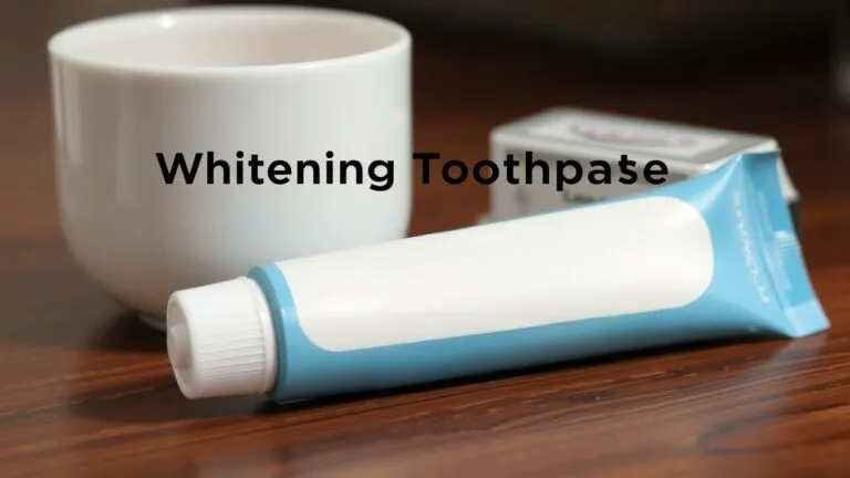 Close-up of a person smiling, showing bright white teeth after using whitening toothpaste.